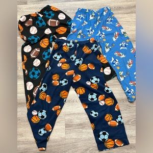 3 pairs of kid’s size L (10/12) pajama pants…sports theme